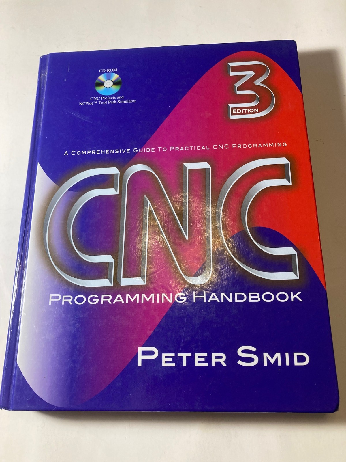 CNC Programming Handbook 3rd Edition by Peter Smid Hardcover with CD-ROM