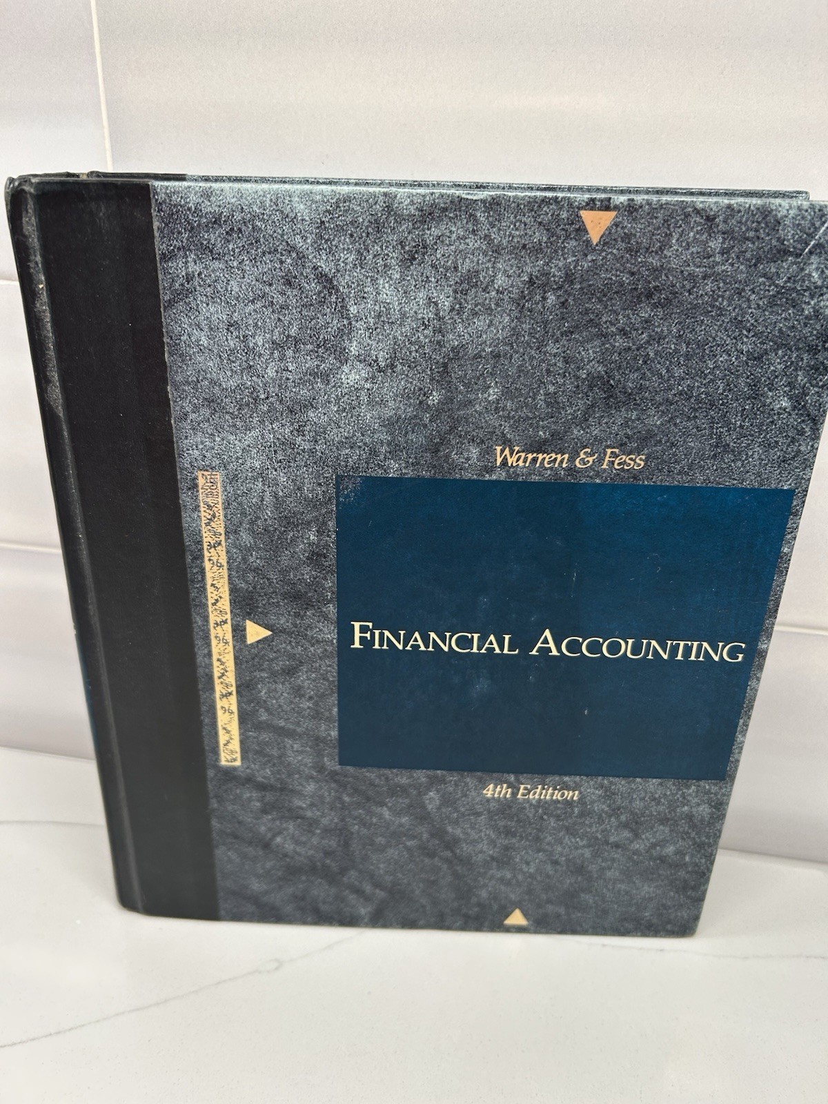 Financial Accounting – Hardcover, by Warren and Fess – 4th Edition SKU F3