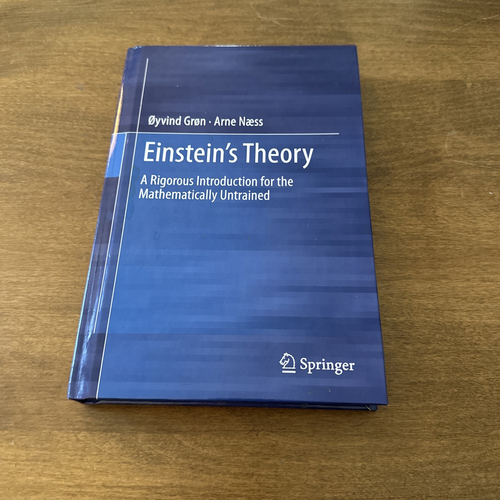 Einstein’s Theory: A Rigorous Introduction for the Mathematically Untrained HC