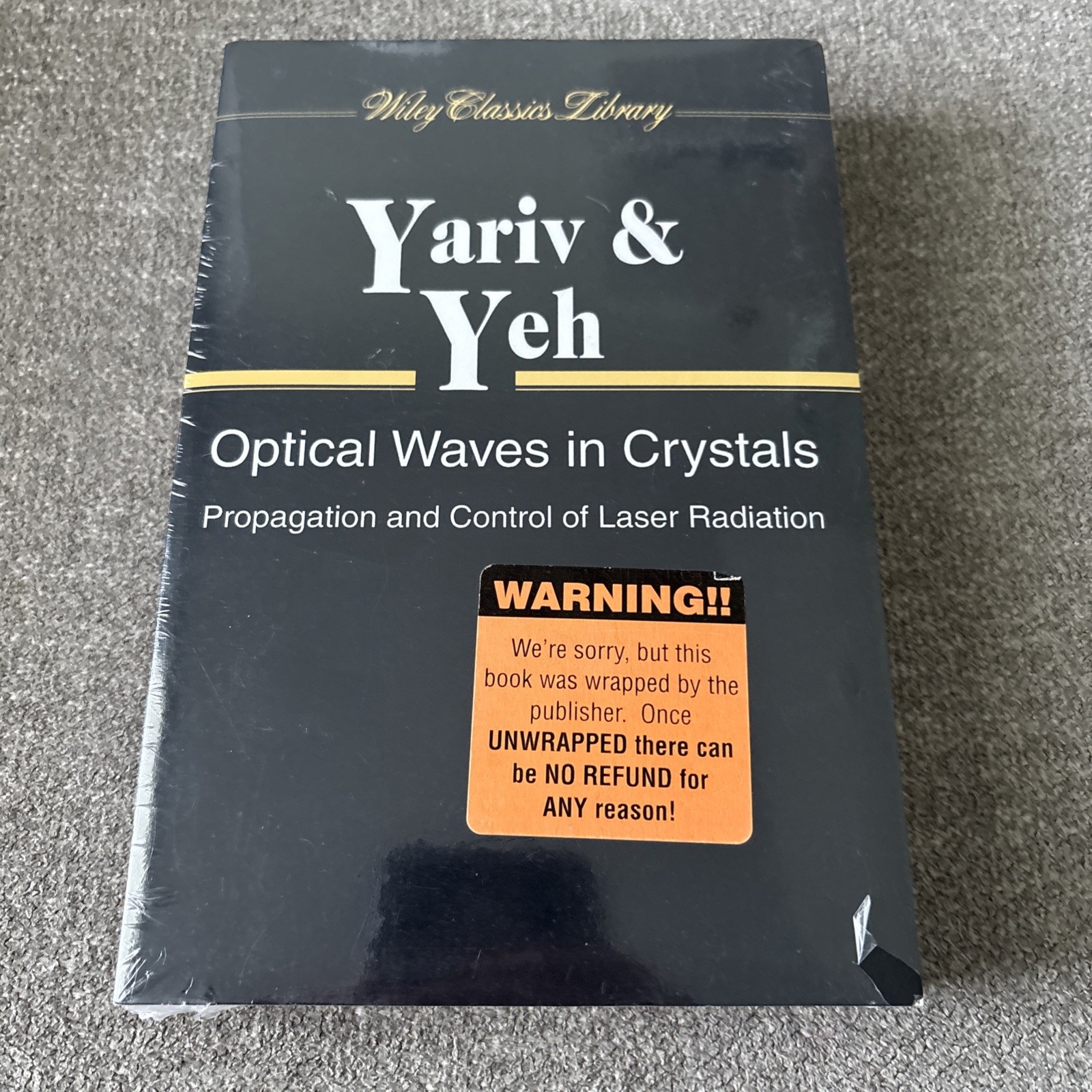 Optical Waves in Crystals: Propagation Control of Laser Radiation
