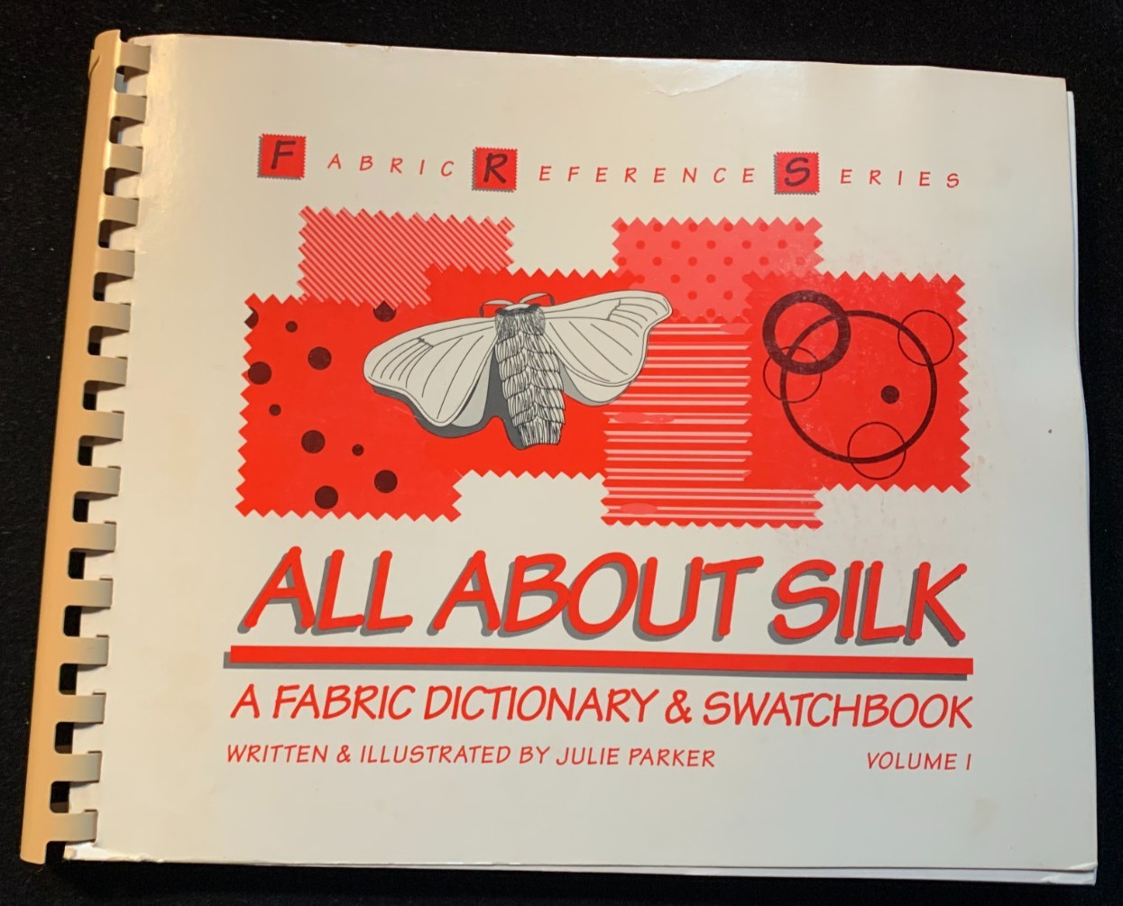 ALL ABOUT SILK: A FABRIC DICTIONARY & SWATCHBOOK VOL. 1 by JULIE PARKER