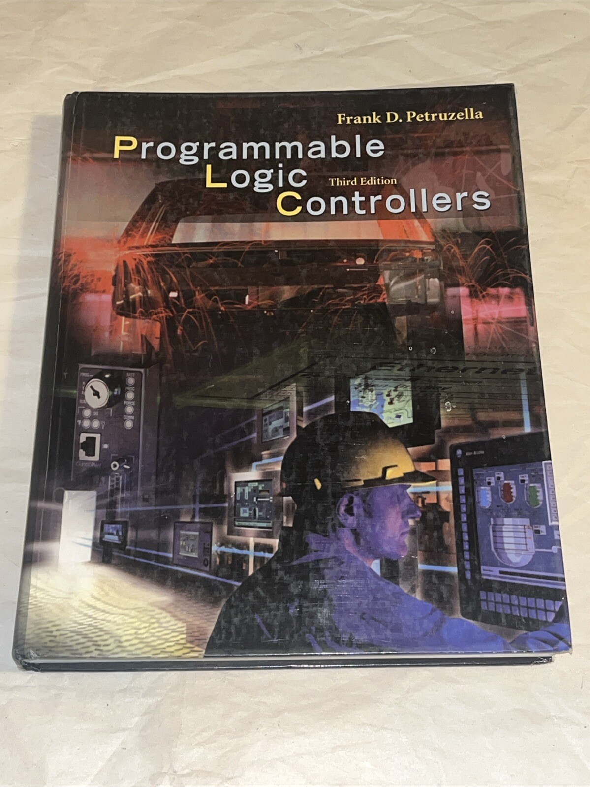 Programmable Logic Controllers + Activities Manual by Frank D. Petruzella