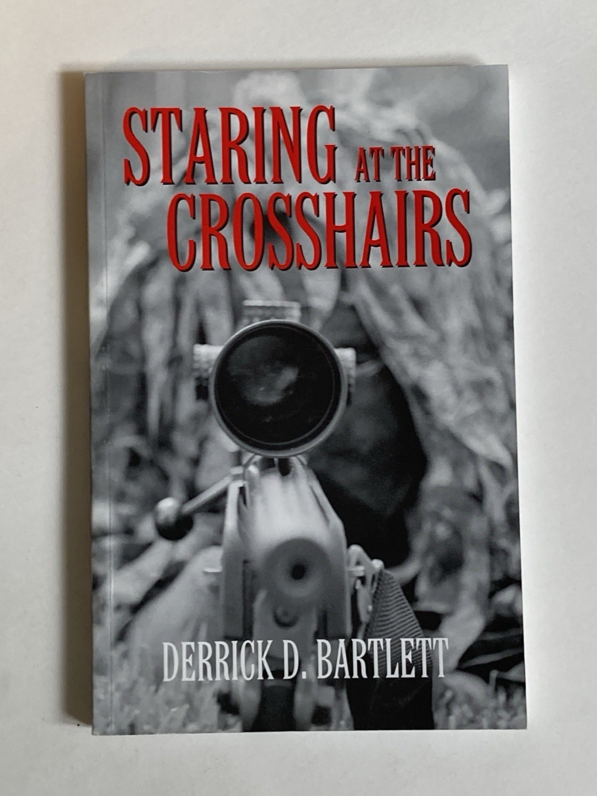 Staring at the Crosshairs by Derrick D Bartlett; 1st Paperback Edition, 2004, NF
